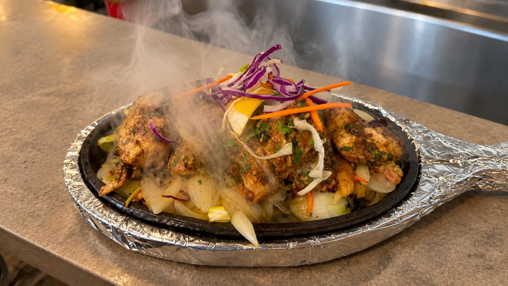 Malai chicken kabab, sizzling from the tandoor